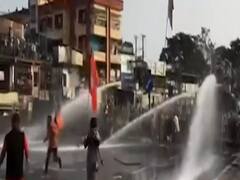 West Bengal: सिलीगुड़ी में BJP कार्यकर्ताओं पर दागे गए आंसू गैस के गोले और वाटर कैनन