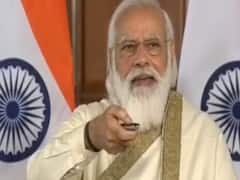 Visuals of PM Modi inaugurating postal stamp ahead of AMU address 