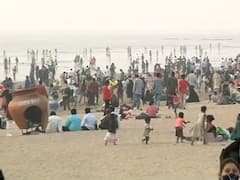 Mumbai: Crowd gathers at Juhu Beach for New Year celebrations despite restrictions, Police deployed 
