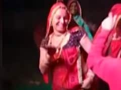 Rajasthan: Women waves pistol while dancing in wedding ceremony