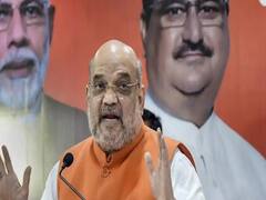 Amit Shah interacts with Balveer Singh at the meeting