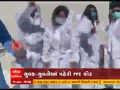 રાજકોટમાં ઉત્તરાયણની કરાઇ અનોખી ઉજવણી, યુવક-યુવતીઓએ PPE કીટ પહેરી ચગાવ્યા પતંગ