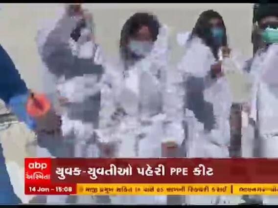 રાજકોટમાં ઉત્તરાયણની કરાઇ અનોખી ઉજવણી, યુવક-યુવતીઓએ PPE કીટ પહેરી ચગાવ્યા પતંગ