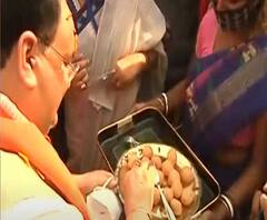 West Bengal Elections 2021: কাটোয়ায় নেতাদের নিজের হাতে মিষ্টিমুখ করালেন নাড্ডা