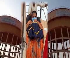 नहीं मिली पेंशन तो पानी की टंकी पर चढ़ी महिला, घंटों बाद नीचे उतरी | Suno UP | ABP Ganga 