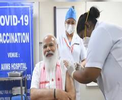 PM Narendra Modi ने एम्स में Corona Vaccine की पहली डोज ली, तस्वीरें आईं