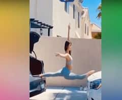 'दो कारों के बीच लड़की का बैलेंस' वाला वीडियो देख हो जाएंगे Shock 